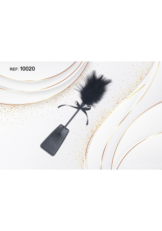 Plumero y paleta todo negro con lazo de raso para juego sensorial
