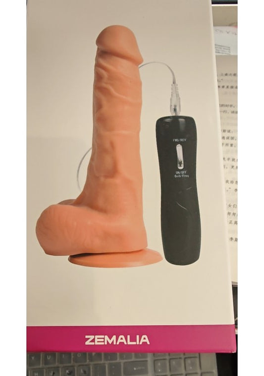 Dildo realista tono piel con base de ventosa y mando de vibración externo, marca Zemalia