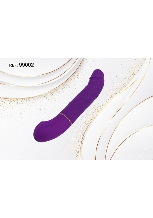 Vibrador curvo de silicona color morado sobre fondo blanco con detalles dorados